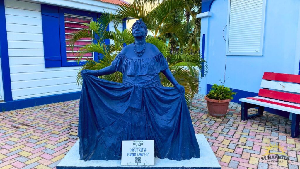 Under SXM Sculptures on the Boardwalk - Evita Ponum Dancer at Bobby's Marina