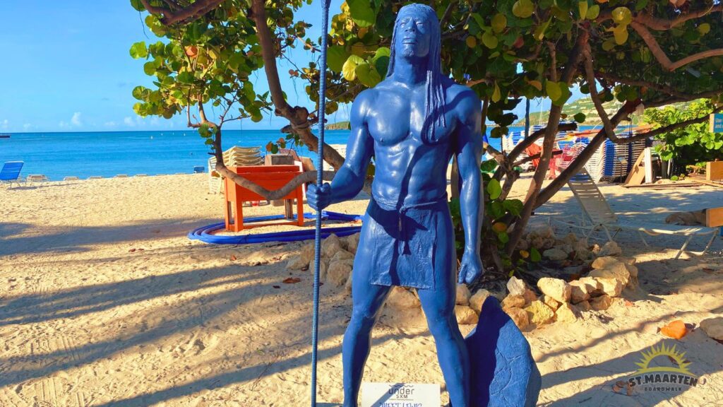 Under SXM Sculptures on the Boardwalk - Lewis Indigenous Warrior in front of Miguel's Hot Beach Spot