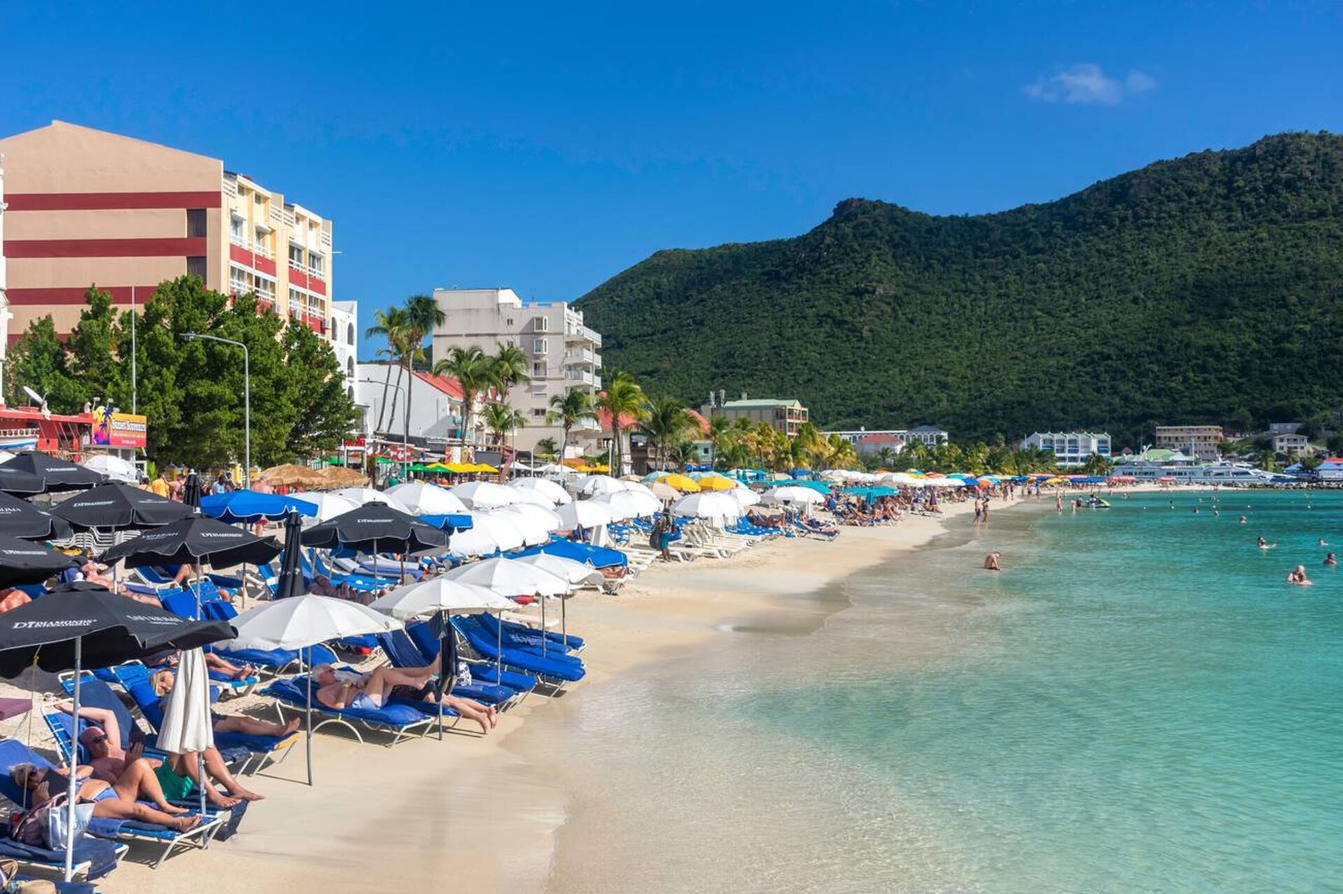 Beach chairs and umbrellas along Great Bay Beach in Philipsburg, St. Maarten